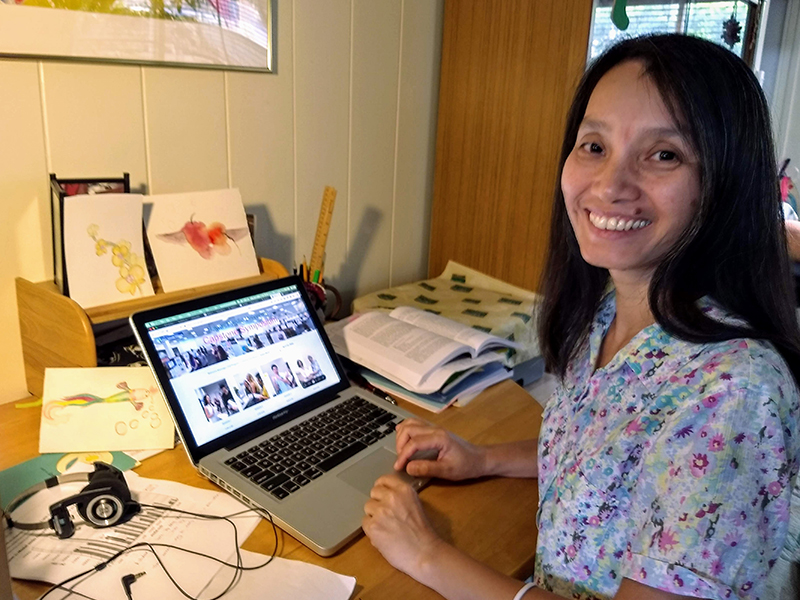 Hanh Nguyen at computer