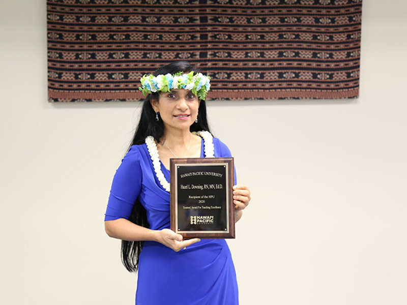 Hazel Downing with Teacher of the Year plaque