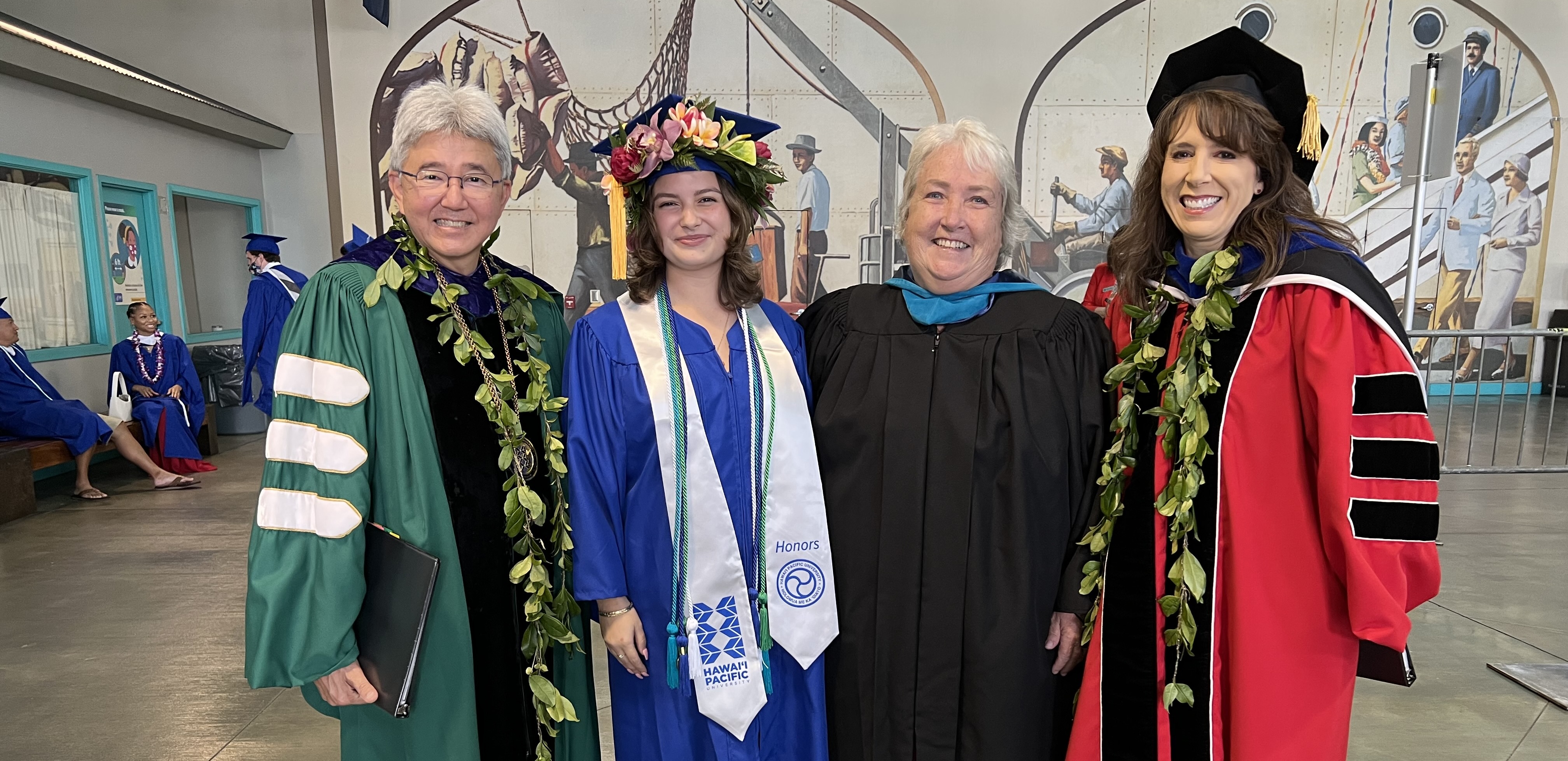 Pictured at HPU Spring 2022 Graduation (Left to Right): HPU President John Gotanda, J.D., Mariah Morgado, HPU Criminal Justice Department Chair and Instructor Sheryl Sunia, HPU Senior Vice President and Provost Jennifer Walsh, Ph.D.