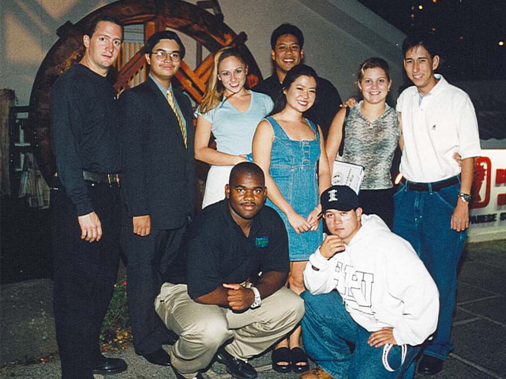 Kiwi (back row, second from left) with friends at HPU.