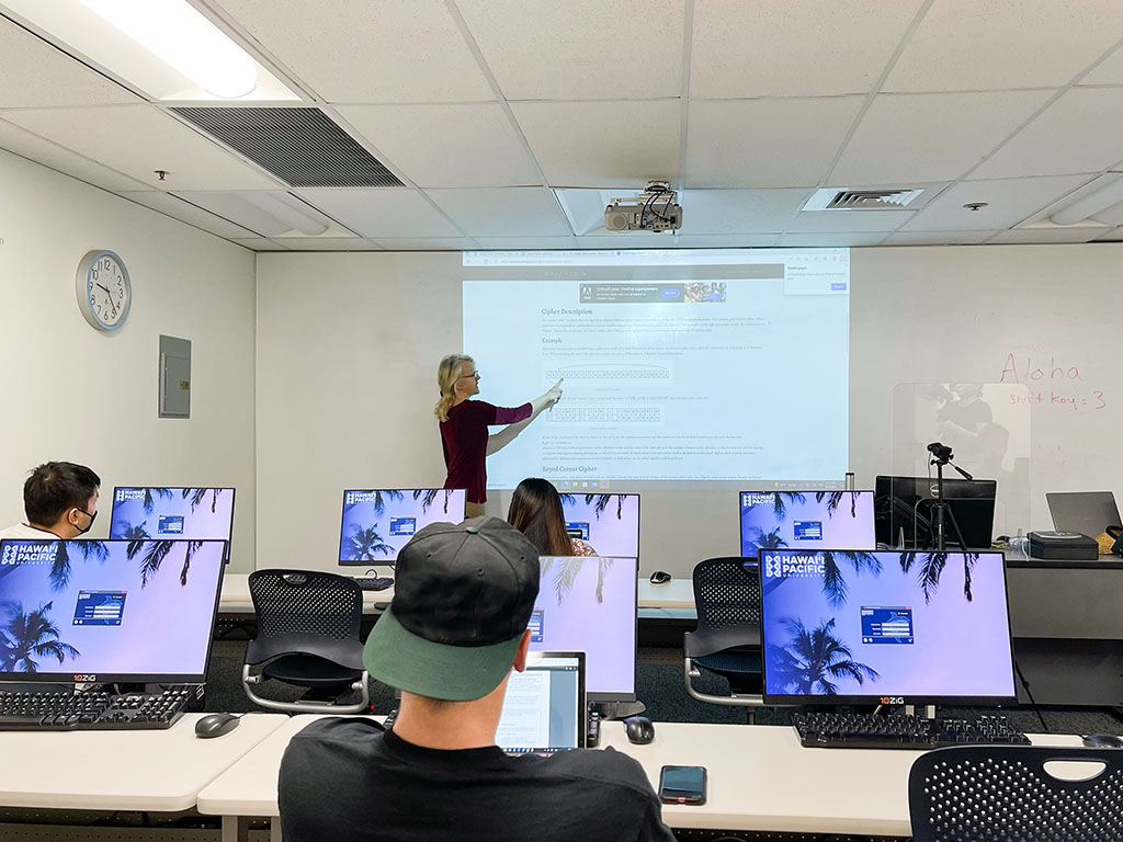 HPU Associate Professor Mary L. Smith instructs a computer science lab.
