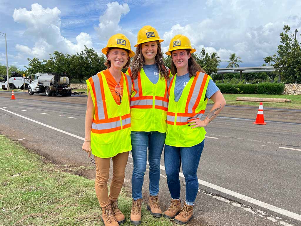 Jennifer Lynch (center) with HPU Master of Science in Marine Science students Cara Megill (right) and Sydney Binette (left) at the Fort Weaver re-pavement construction site