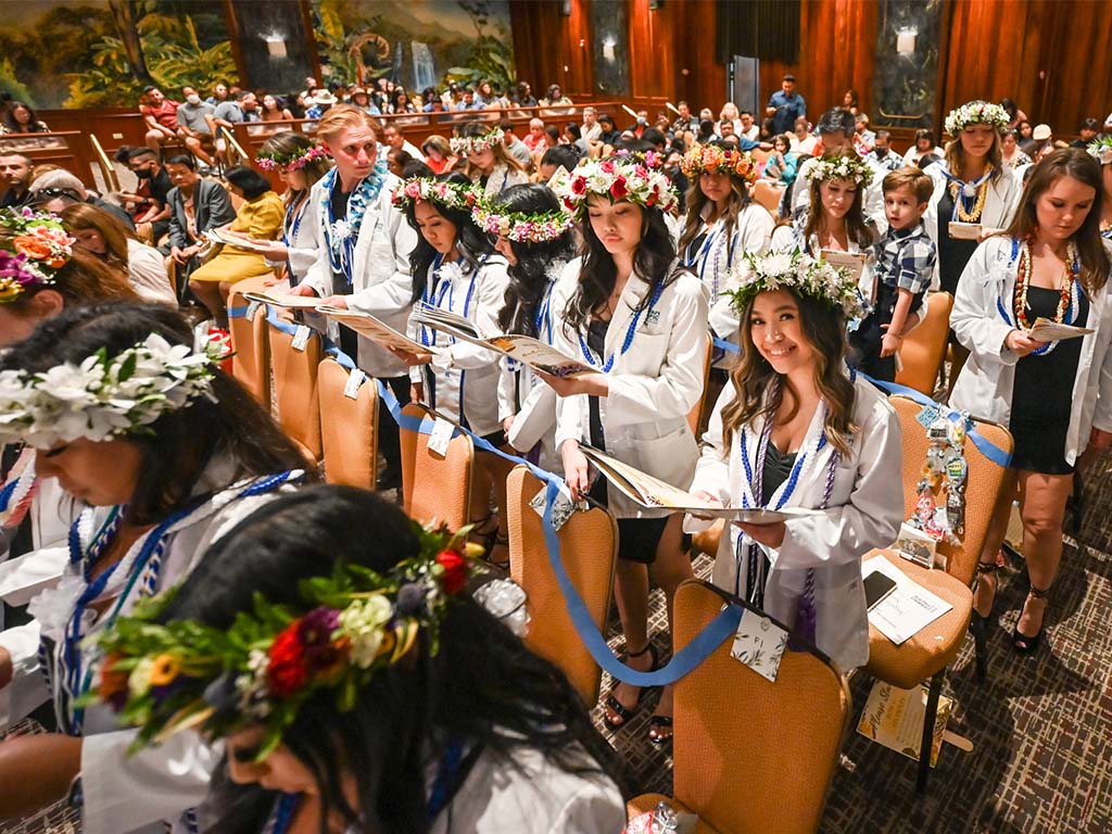 53 Bachelor of Science in Nursing graduates recite the 'Modern Nightingale Pledge'