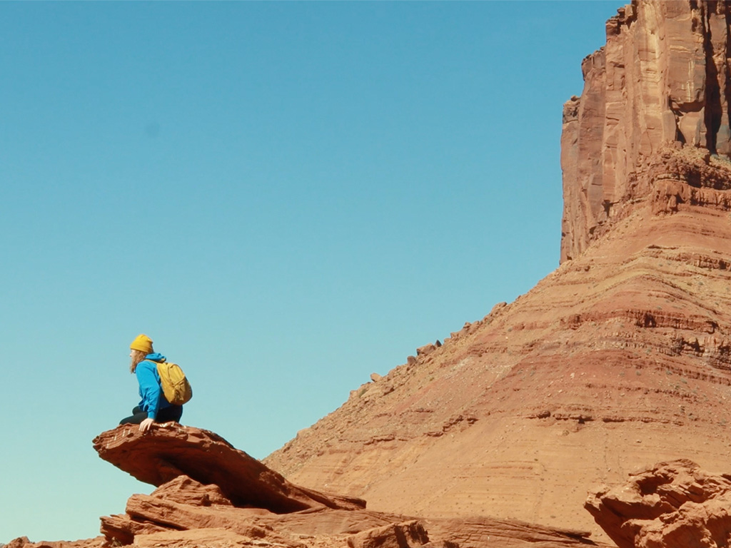 Abby Wilson seen on a cliff in the short film 'Ascent'