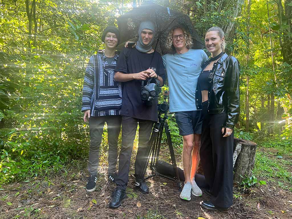 Bressel and actors pose while filming on location