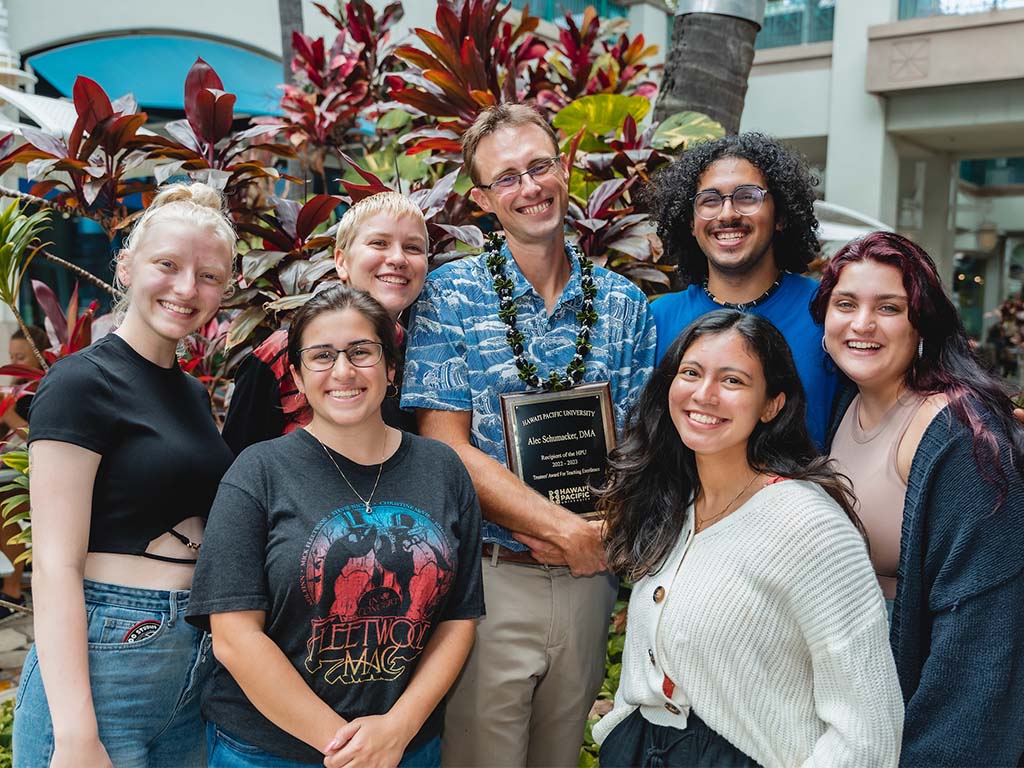 Alec Schumacker with HPU students