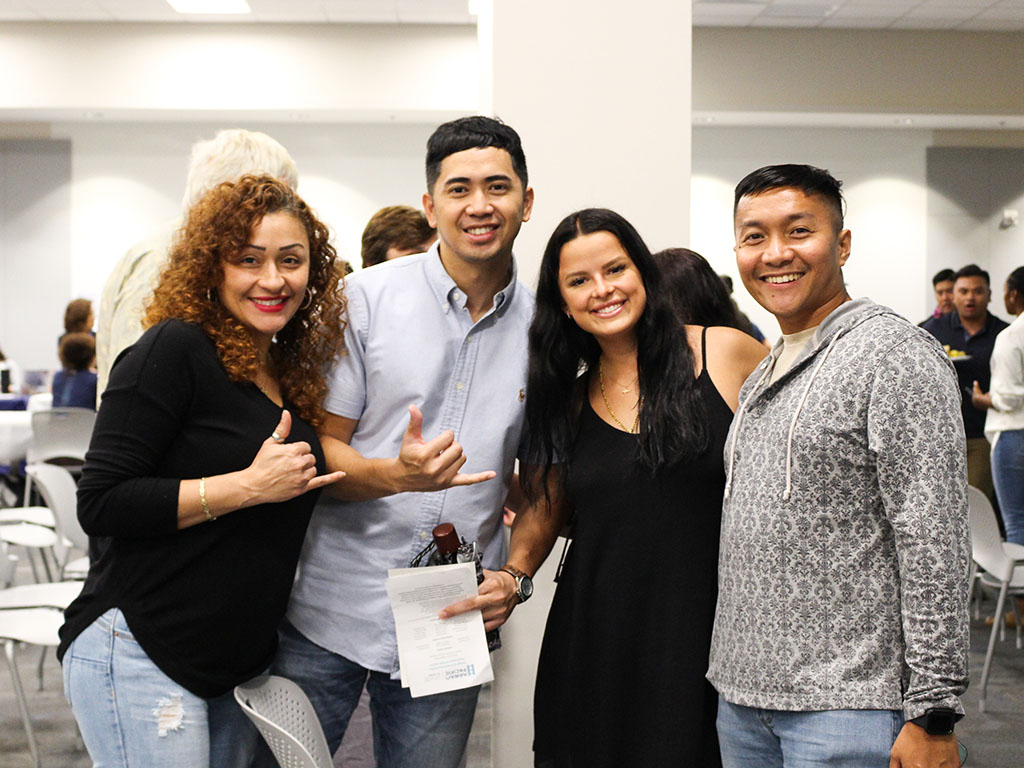 HPU students and community members at the neighborhood watch program