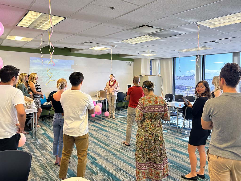 PsyD students and professors gathered at Waterfront Plaza campus to celebrate the launch of the new textbook