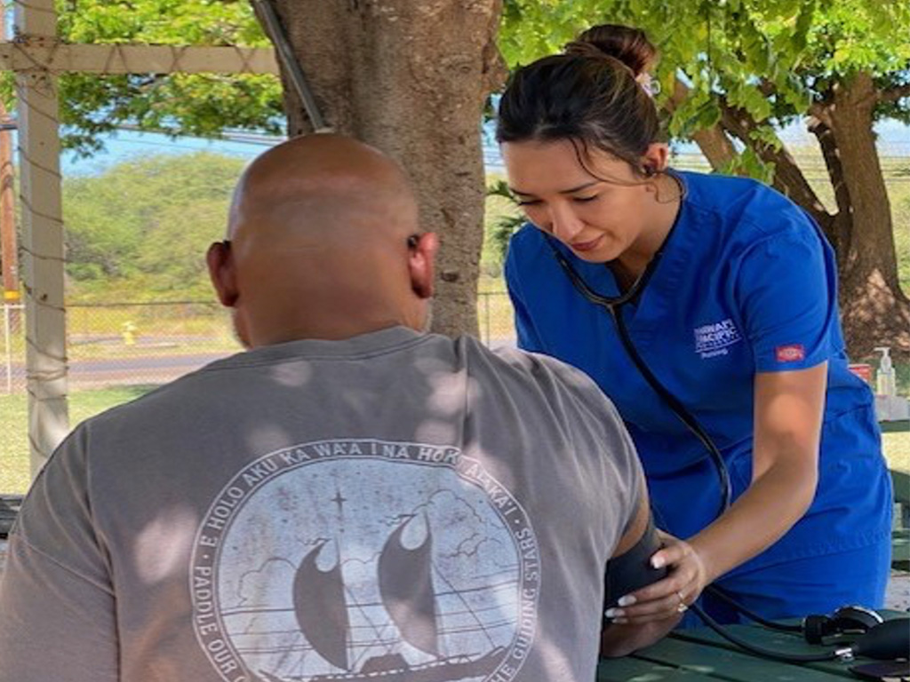 Jennifer Huerta Bandy providing medical assistance