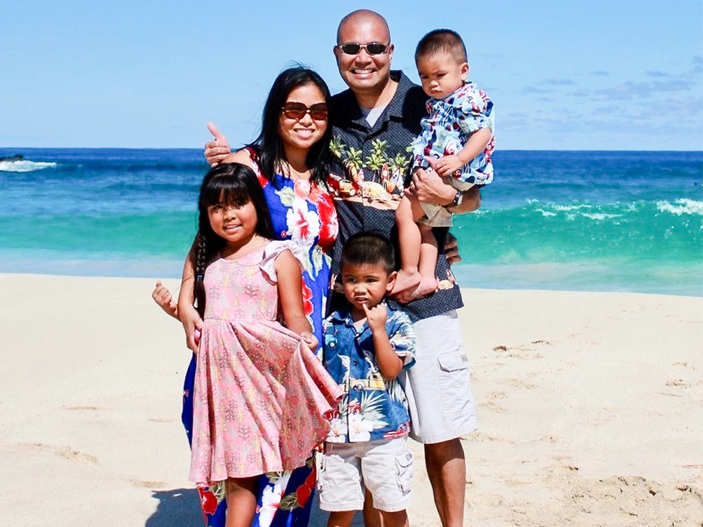 Joel Bauzon with his family in Hawaii