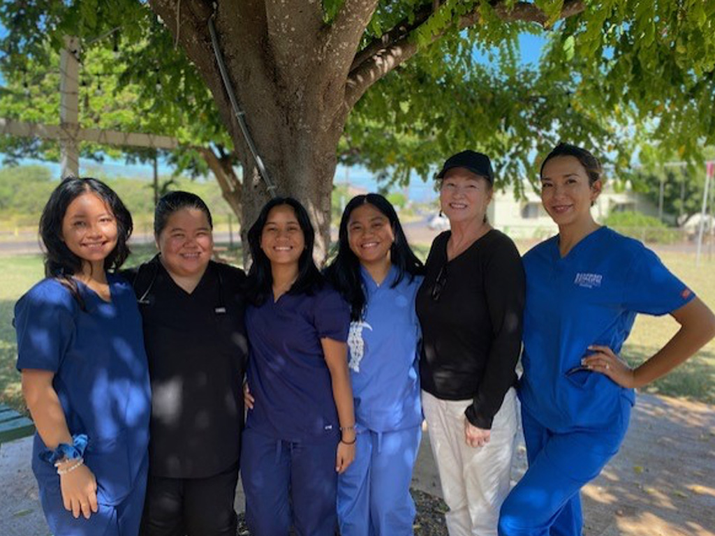 Ku'ulei Yamamoto (second from left), Joy Bliss (second from right), Jennifer Huerta Bandy (far right)