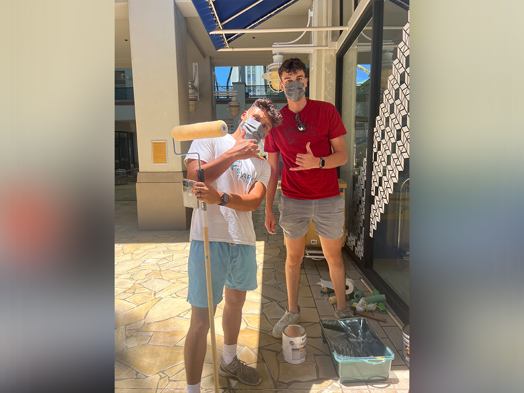 Student Workers, Elijah and Tucker, get ready to work on the Makerspace