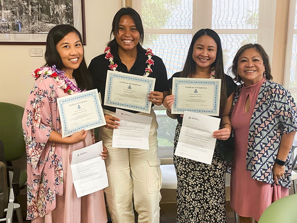 HPU students (left to right) Charlenee Caraang-Gilbert, Alyssa Gabriel, Bethany Dela Cruz with HPU Dean of the School of Nursing Edna Magpantay-Monroe