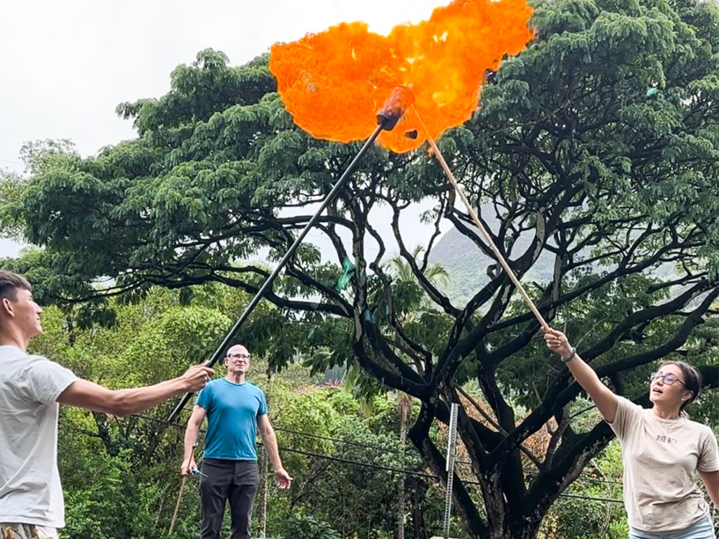 Professor Horgen's experiment featured hydrogen gas contained in a balloon, oxygen, and an ignition source, resulting in a mesmerizing combustion in mid-air