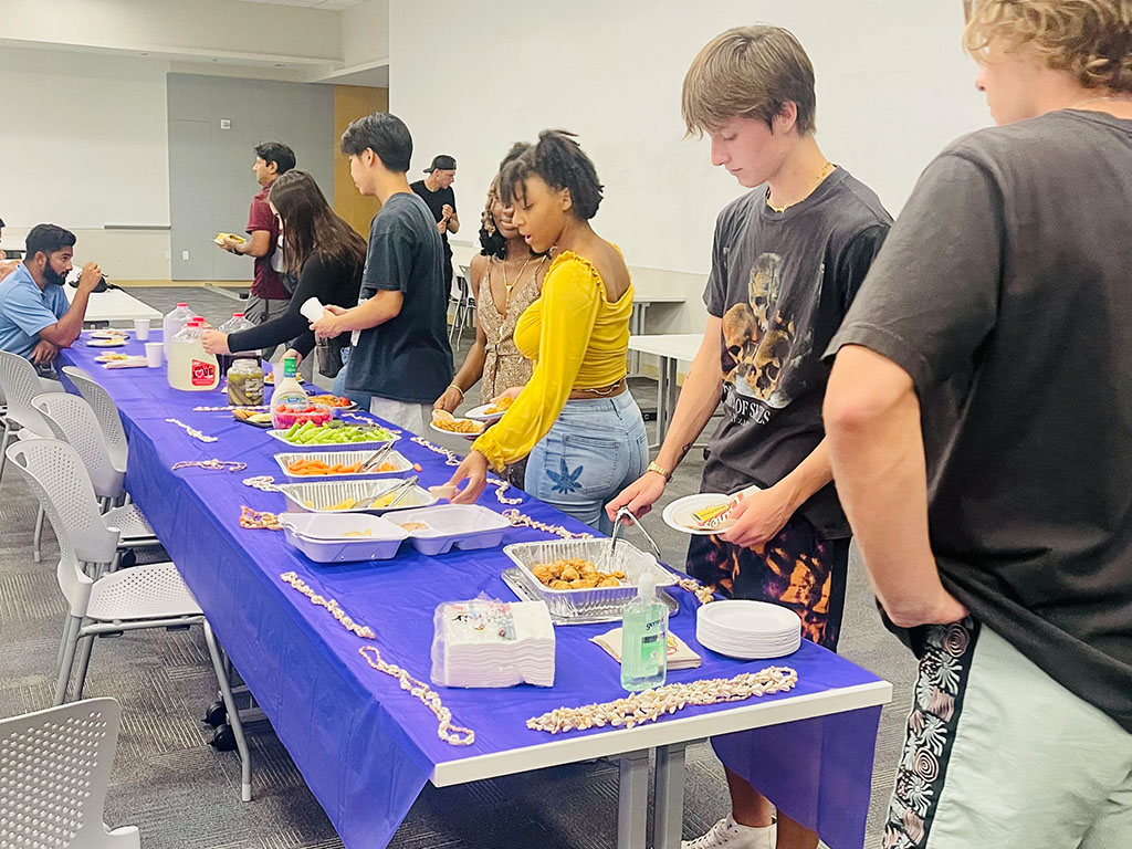 The gathering included a warm spread of food from Raising Cane's restaurant