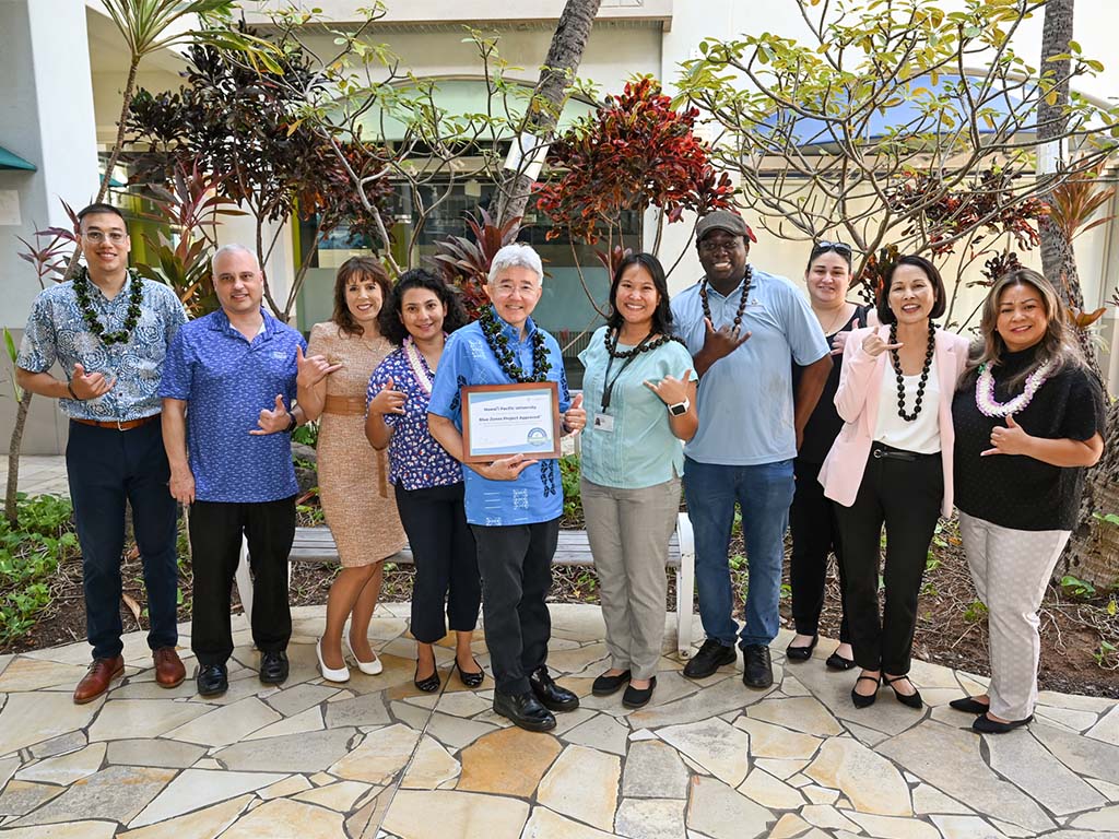 HPU President John Gotanda (center) joined by members of the Blue Zones Project and HPU staff