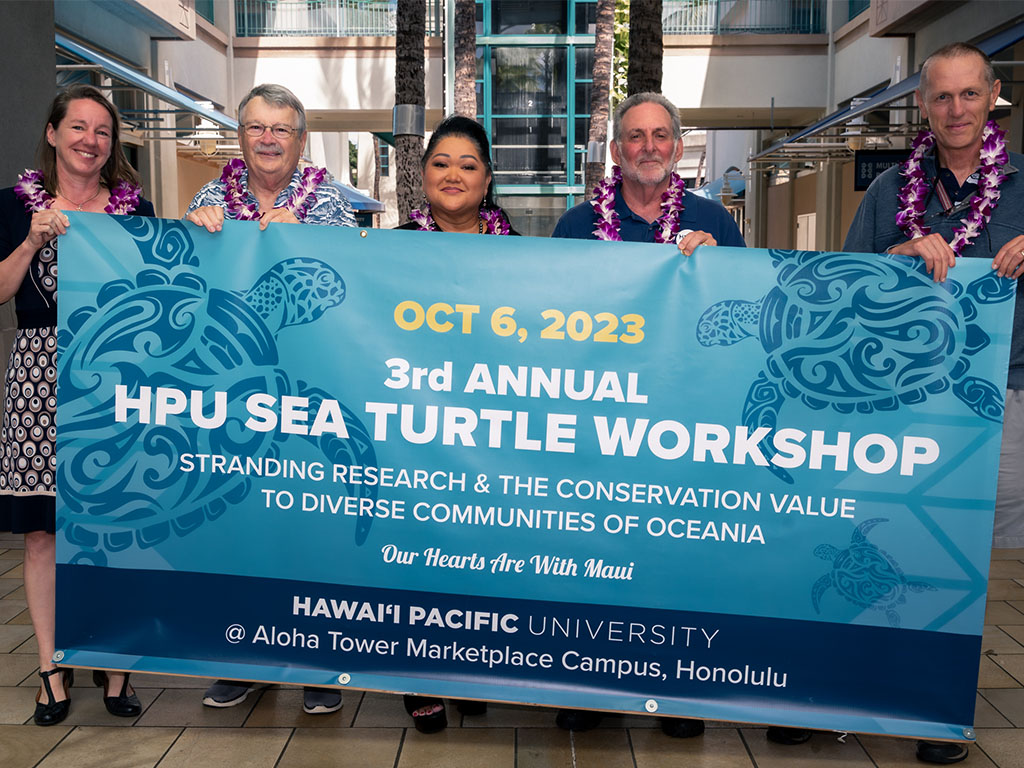 From left to right are the 2023 workshop organizing committee members: Brenda Jensen, Ph.D., HPU Dean of the College of Natural and Computational Sciences (CNCS); George Balazs, Golden Honu Services of Oceania and retired NOAA sea turtle biologist; Jeannie Manzano, HPU CNCS staff;  Jon Gelman, Hawaiʻi Marine Animal Response President; and Thierry Work, DVM, USGS National Wildlife Health Center Honolulu Field Station project leader