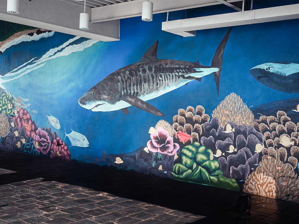 HPU's new mural, 'The Reef at Sharky's Cove' at Aloha Tower Marketplace