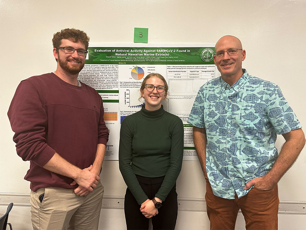 HPU students, alumni, and faculty presented at this year's Biomedical and Health Science Research Symposium (pictured left to right: Stanley Harms, Elizabeth Milner, David Horgen)