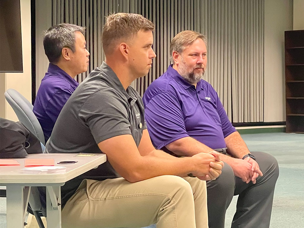 Hawaiian Airlines employees Justin Nowak, Kenny Lee, and Kalani Sloat spoke with HPU students during a panel session