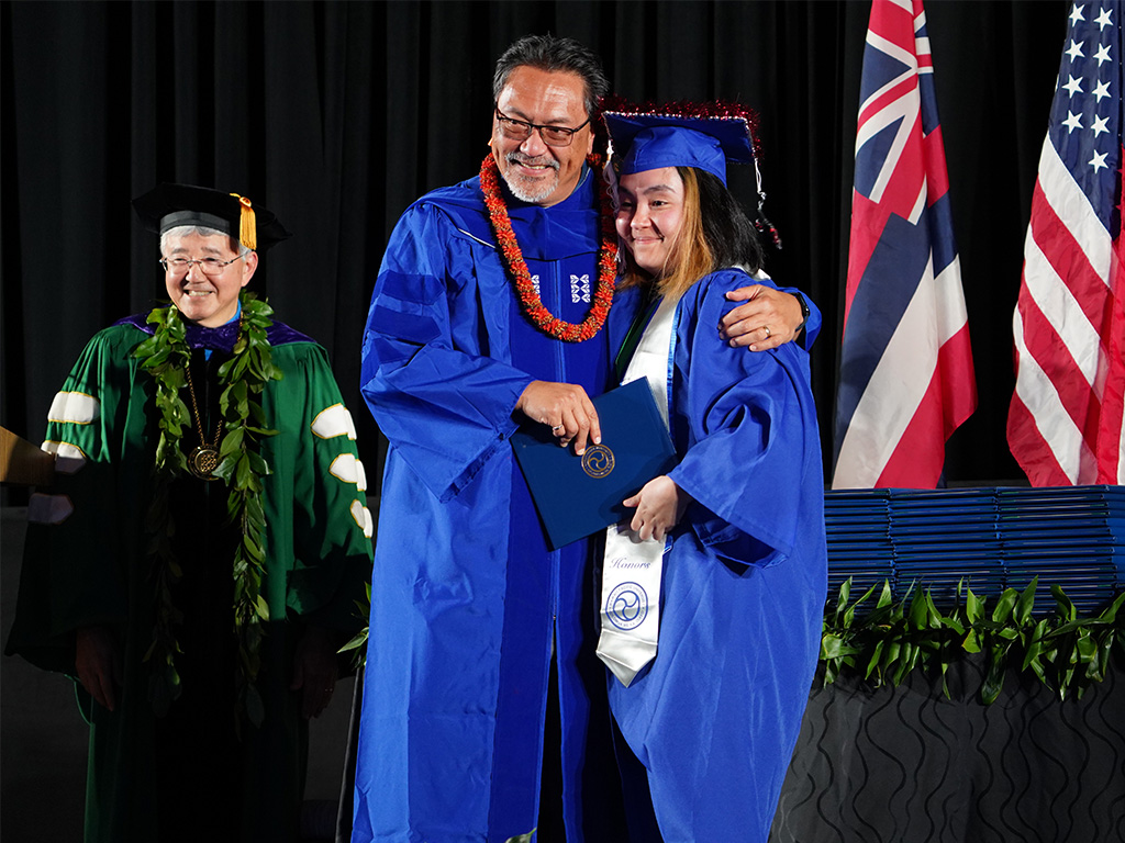Lance Wilhelm with his daughter Kate Nohea Wilhelm at the graduation ceremony