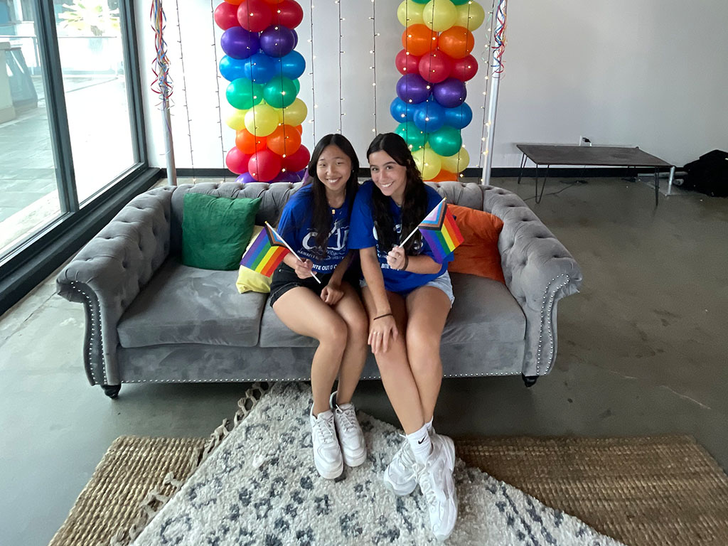 Marisol Castillo and CAB Membership Director Kanon Morimoto celebrate their success at CAB's Pride Month Drag Brunch event