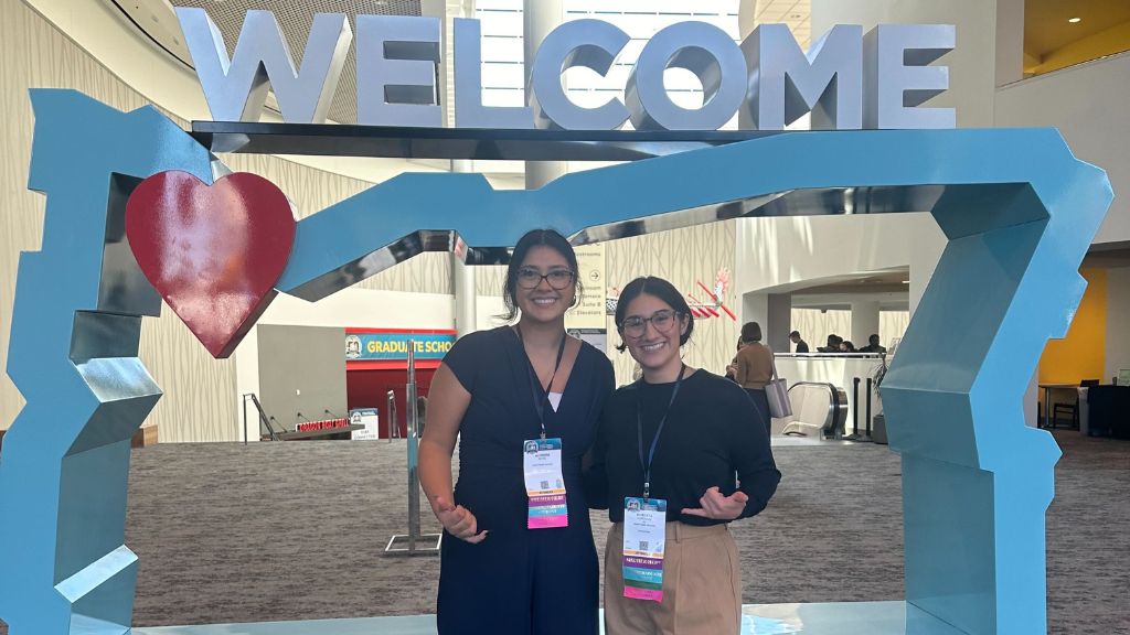 HPU marine biology alumna Roberta Cardenas (BS '23) and undergraduate marine biology major Alondra Reyes attend the National Diversity in STEM conference. 