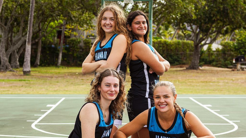 Ella Berge with other international students on the basketball team. Photo by: Ken Munoz, @ascender.productions