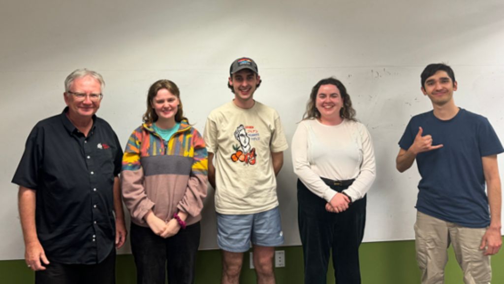 Irish Championship Team alongside Advanced Public Speaking professor Dr. John Hart and HPU Debate Coach Kaikane Glorioso, from left to right: Dr. John Hart, Louise Cullen, Eoin Ryan, Clidohna McHugh, Kaikane Glorioso