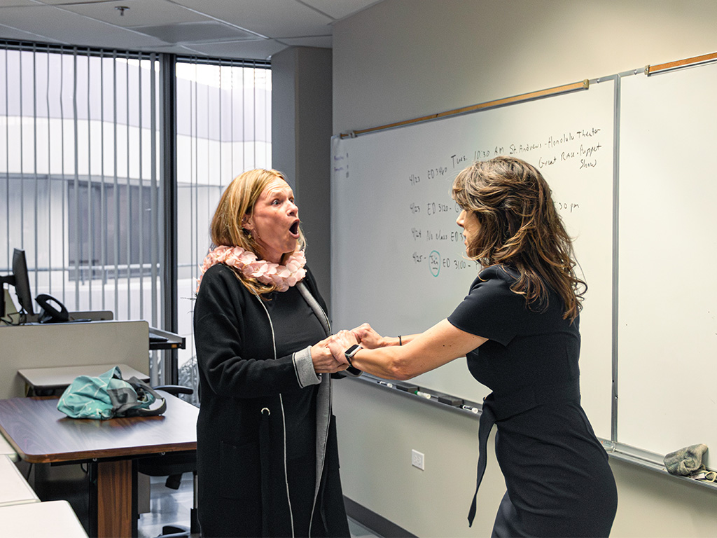 Kathryn Vaughn received word of the award from Provost Jennifer Walsh in a surprise announcement