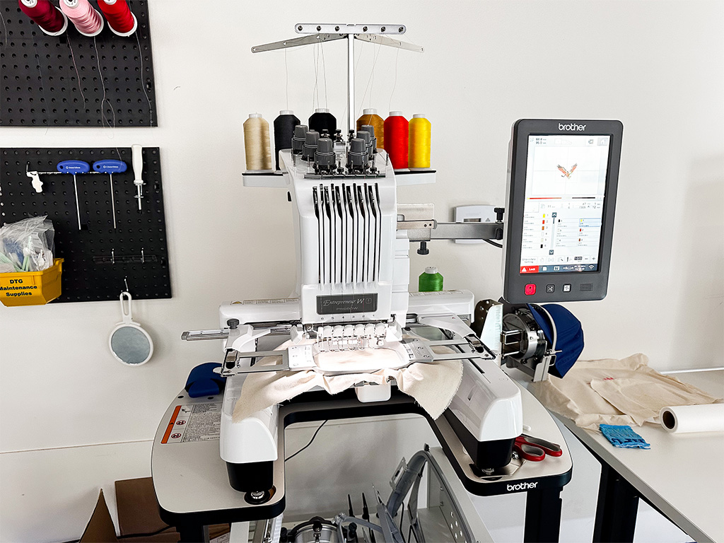 An embroidery machine in the maker space