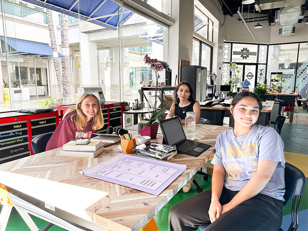 HPU students collaborating in the new maker space at Aloha Tower Marketplace