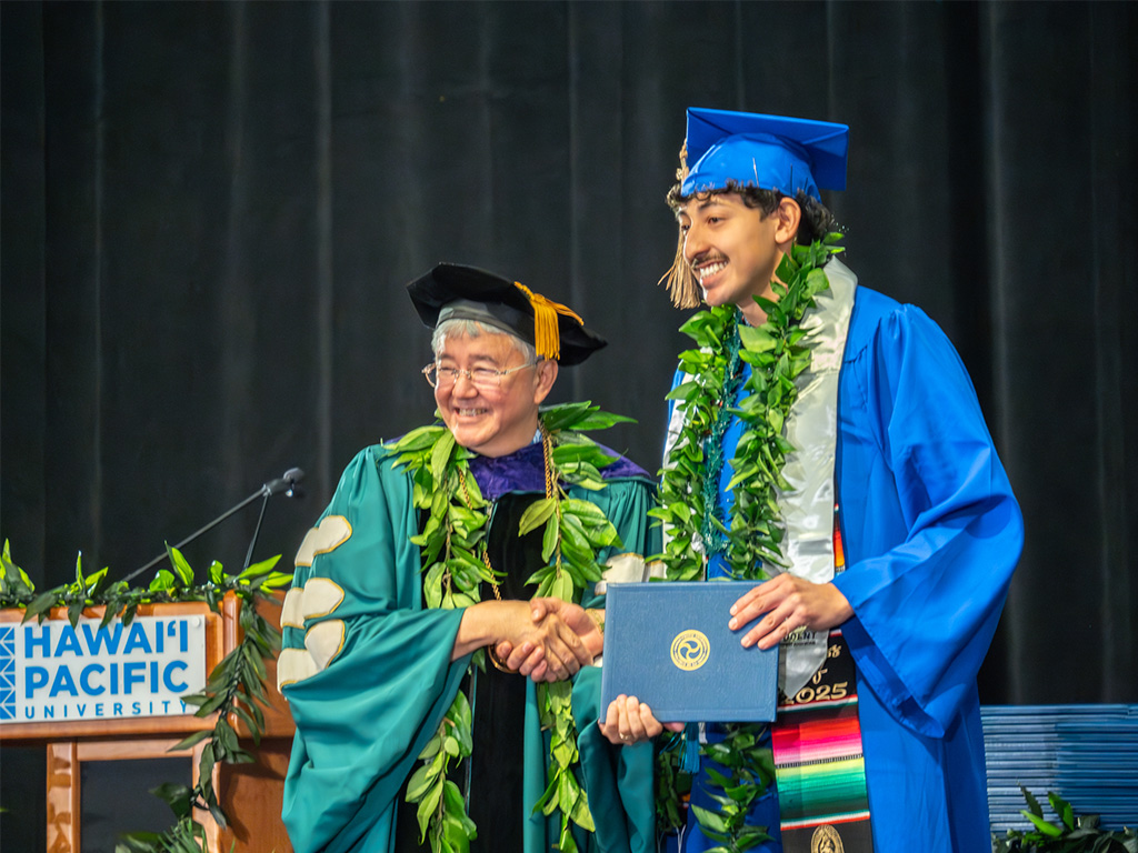HPU President John Gotanda and an HPU graduate 