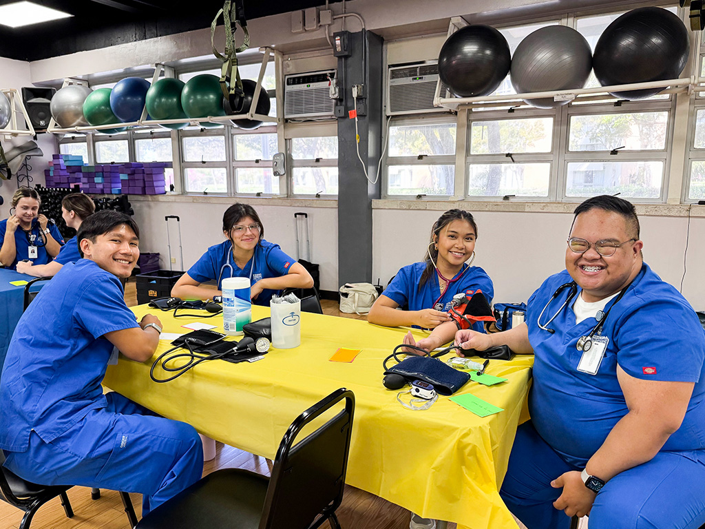 HPU students helped to screen over 100 children and their parents at the YMCA's 'Healthy Kids Day' event