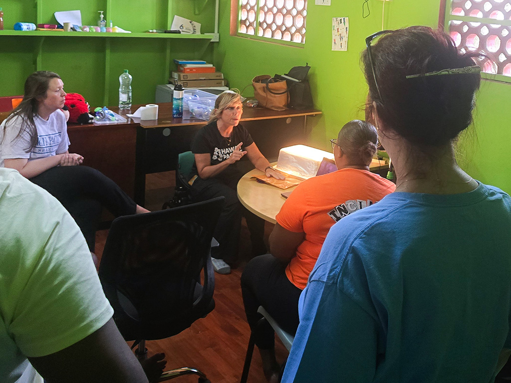 Patty Coker-Bolt teaches light box education to a class in St. Lucia