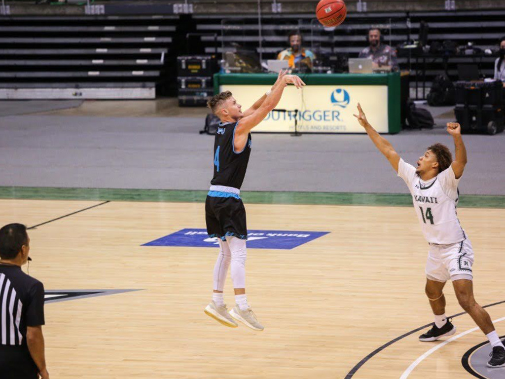 Rowlands was a a guard for the Sharks and averaged a career high 15 points-per-game in his senior year
