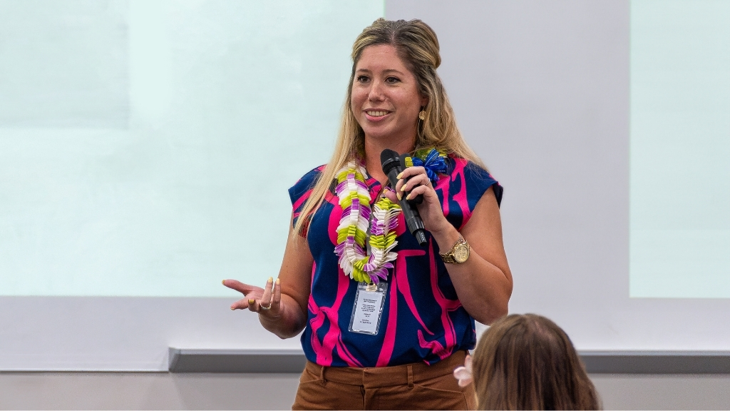 CEO and President of Child and Family Service engages with the audience during her talk