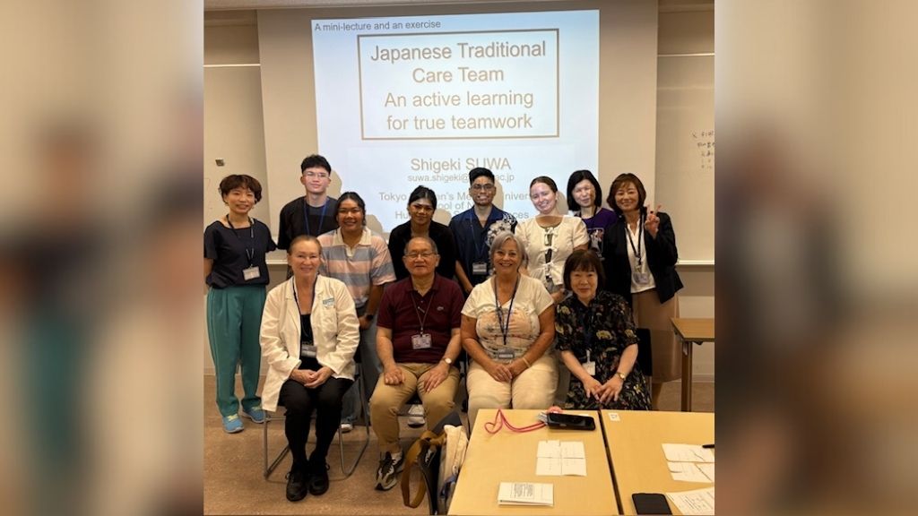 HPU School of Nursing students and faculty, Assistant Professor Joy Bliss (front row, first on left), Ph.D., RN, and Lecturer Jo Wakayama (front row, third from left), MSN, APRN, FNP-BC, with the Tokyo Womenʻs Medical University professors