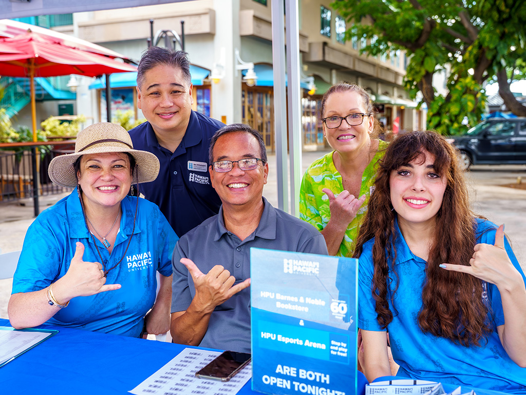 HPU faculty, staff, and students checked in attendees at the registration tables