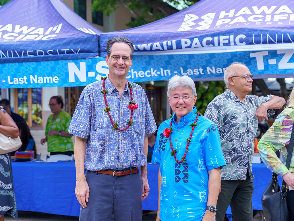 Hawai'i State Senator Karl Rhoads (left) attended the event. He is pictured with HPU President John Gotanda