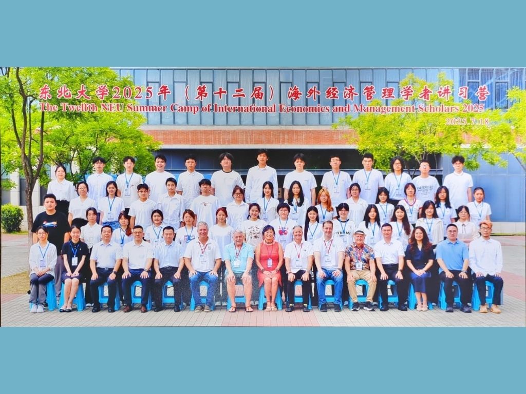 Ken Schoolland (seated, fifth from right) at the Twelfth NEU Summer Camp of International Economics and Management Scholars conference in Shenyang, China