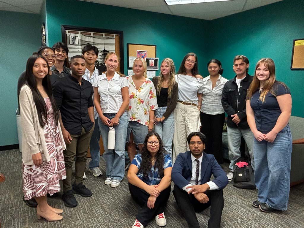 The HPU Debate Society members and students in the COM 2640 Argumentation and Debate course