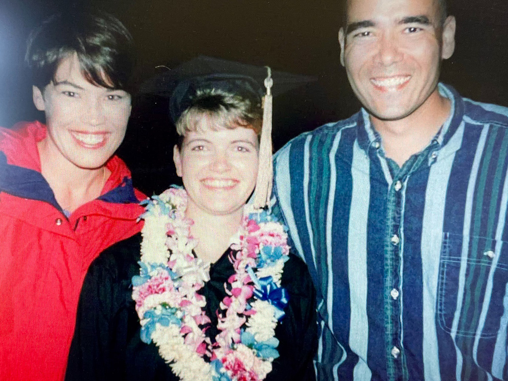 Jill Castilla with friends on her HPU graduation day