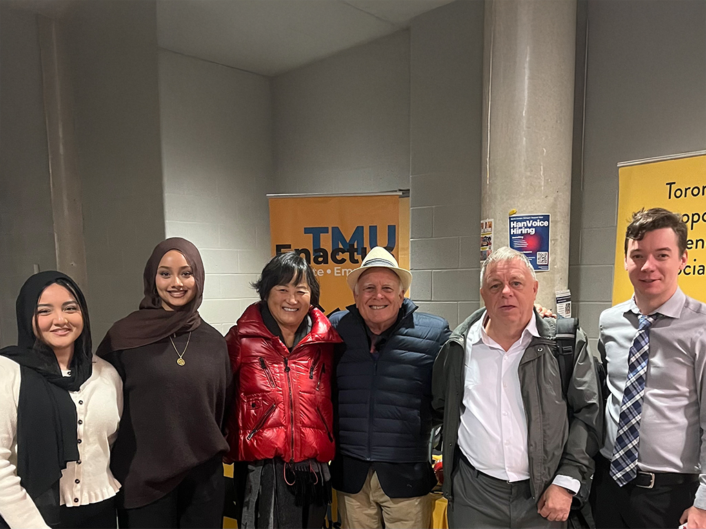Ken Schoolland (center) spoke to the ENACTUS Club at Toronto Metropolitan University