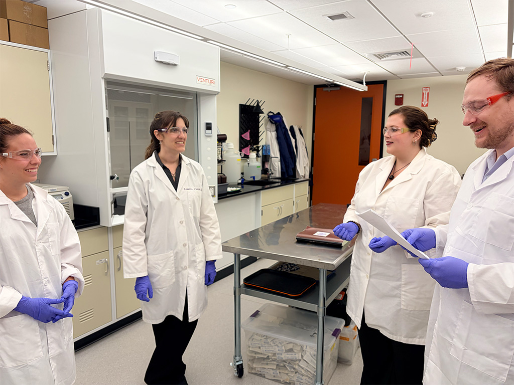 Jessica Jacob (second from left) with HPU undergraduate research students Maiya Johnson, Kennedy London, and Abraham Dare (left to right)