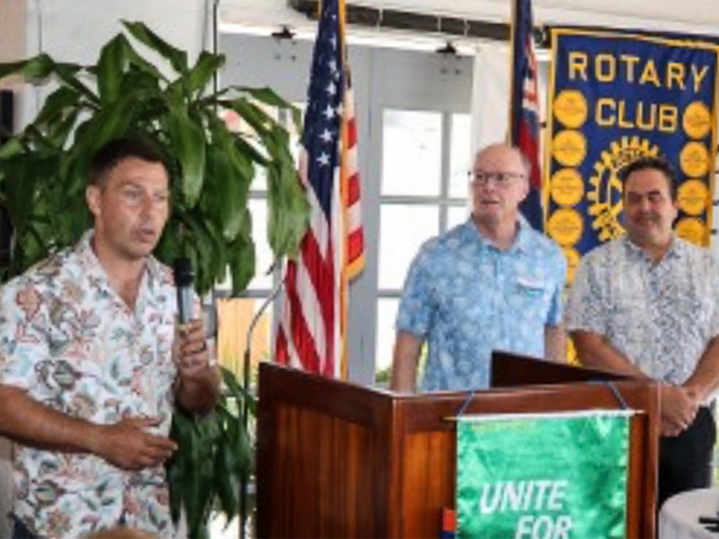 Ben speaking at the Rotary Club of Waikiki, where he is a member