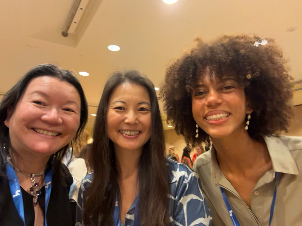 HPU Startup Challenge participants Mika Mailani Chang (center) and Jenna Bond (right) with HPU Dean Amy Nguyen-Chyung at the 2026 East Meets West conference
