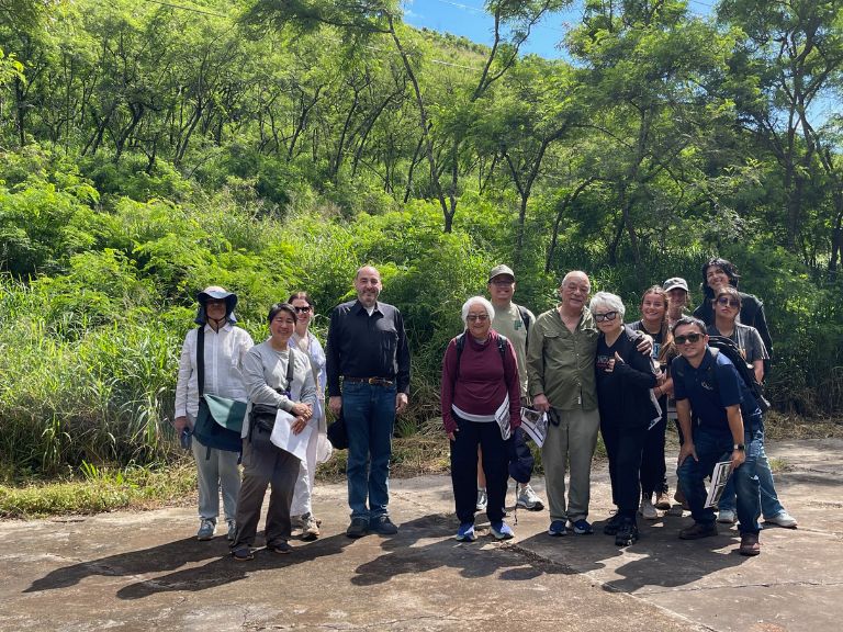 Tour group visiting Honouliuli National Historic Site