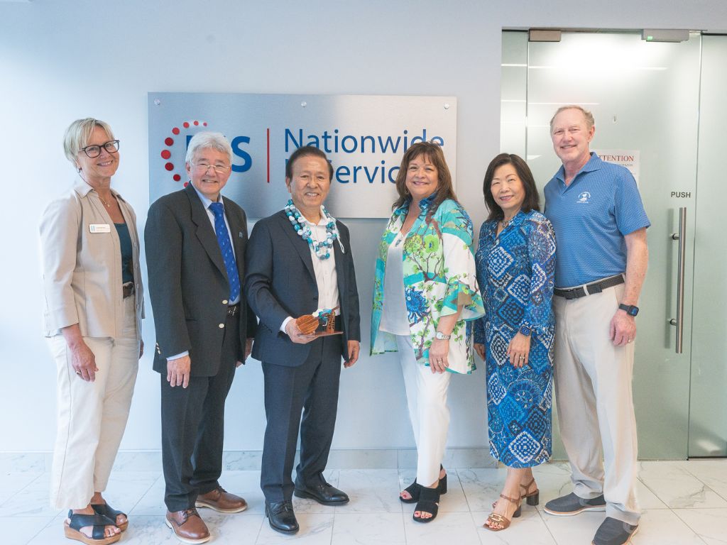The HPU team congratulating C.K. Park on his award, from left to right: AVP Liisa Franzen, President John Gotanda, C.K. Park, VP Maureen Silva, Board of Trustee and alumna Shue-Jane Thompson, alumnus Bruce Thompson