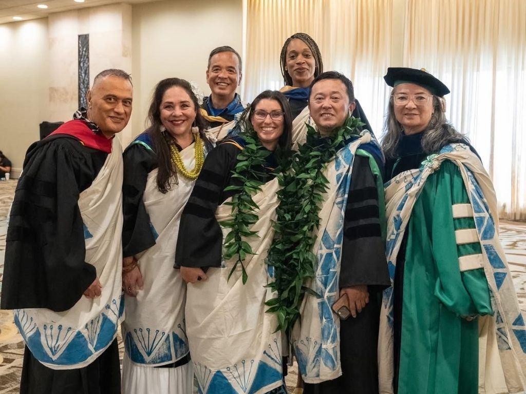 At commencement, pictured are HPU School of Social Work faculty from left to right, Peter Mataira,Ph.D., Tammy Kahalaopuna Kahoʻolemana Martin, Ph.D., Paul Tran, Danielle Giroux, Ph.D., Gia Douglas, Vince Okada, Ph.D.,and Lori Daniels, Ph.D